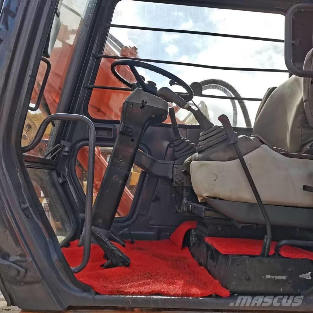 Hitachi EX 100 W D Kolesové rýpadlá