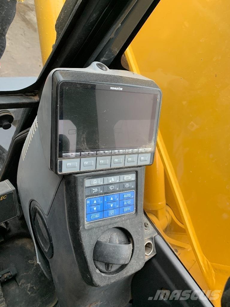 Komatsu 138 us -8 Pásové rýpadlá