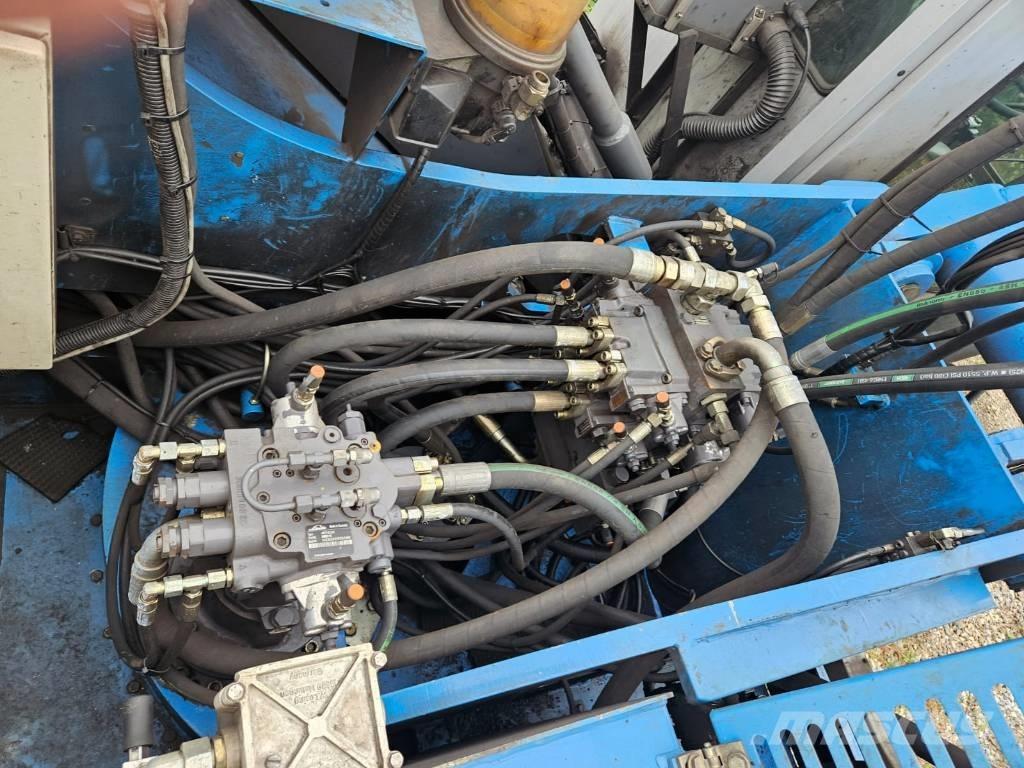 Fuchs MHL 340 Stroje pre manipuláciu s odpadom