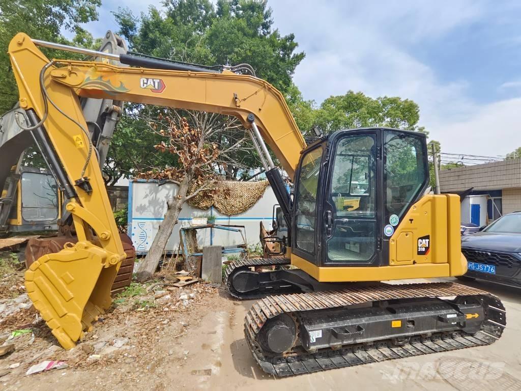 CAT 310 Pásové rýpadlá