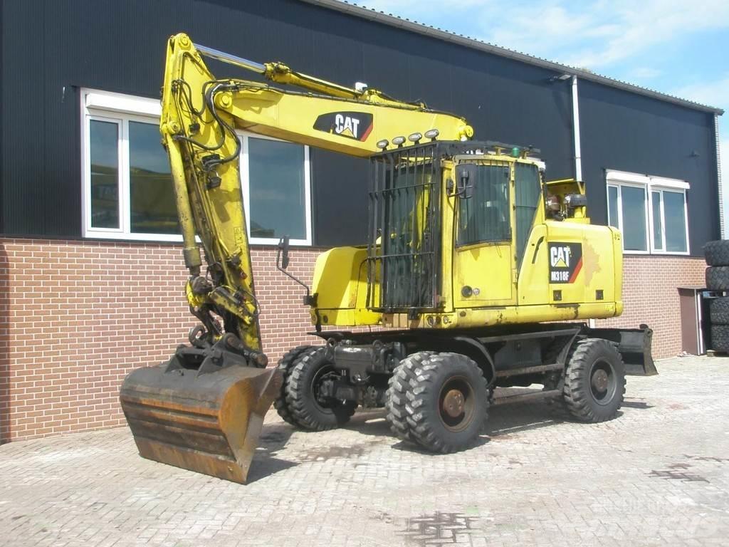 CAT M318F Kolesové rýpadlá