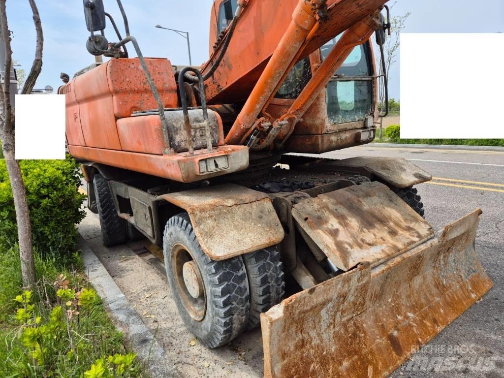 Doosan DX210WA Kolesové rýpadlá