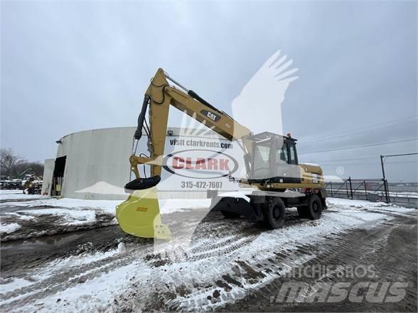 CAT M318D Kolesové rýpadlá