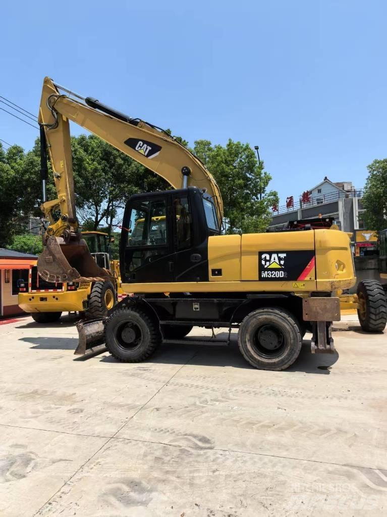 CAT M 320 Kolesové rýpadlá