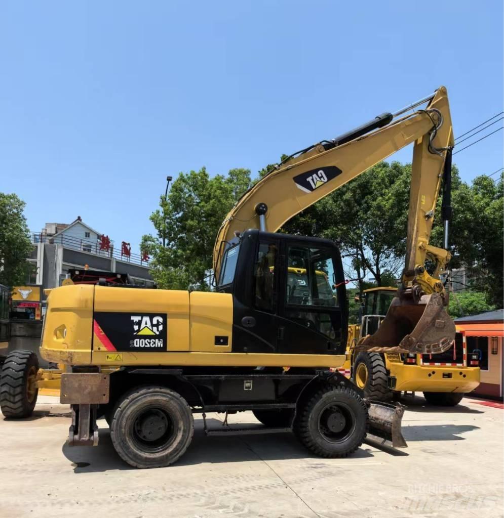 CAT M 320 Kolesové rýpadlá