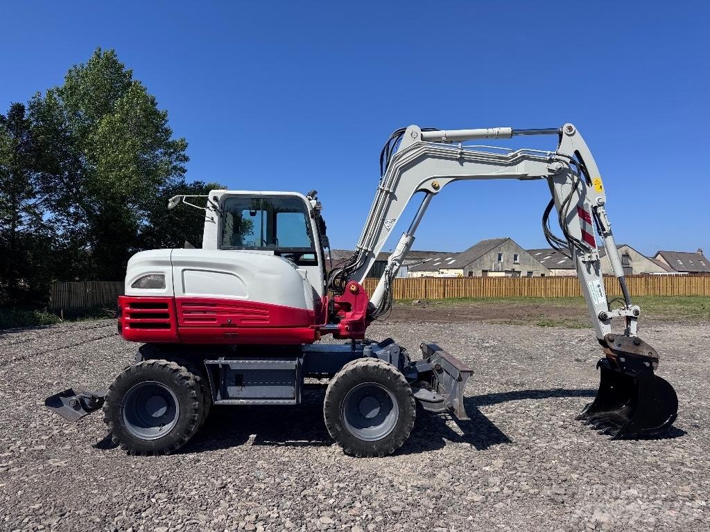 Takeuchi TB 295 W Kolesové rýpadlá