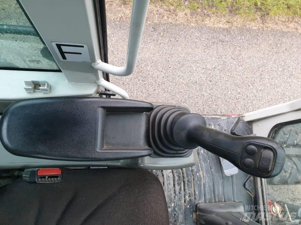 Takeuchi TB 295 W Kolesové rýpadlá