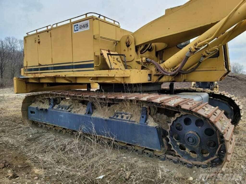 CAT 245 Pásové rýpadlá