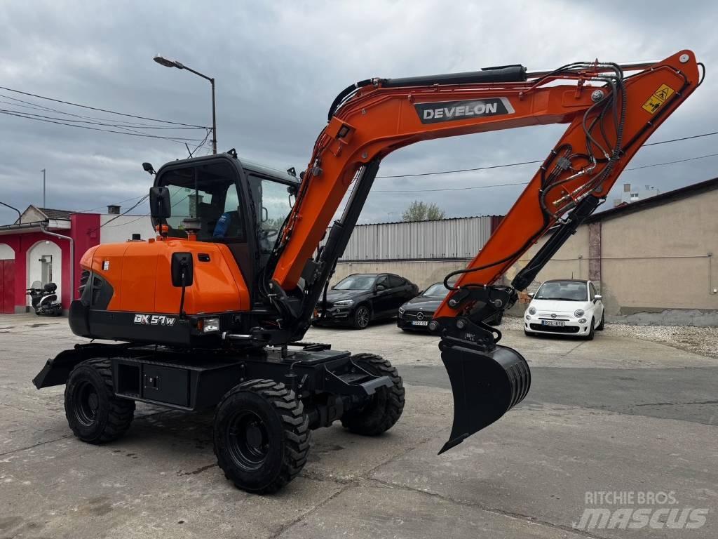 Develon DX 57 W-7 Kolesové rýpadlá