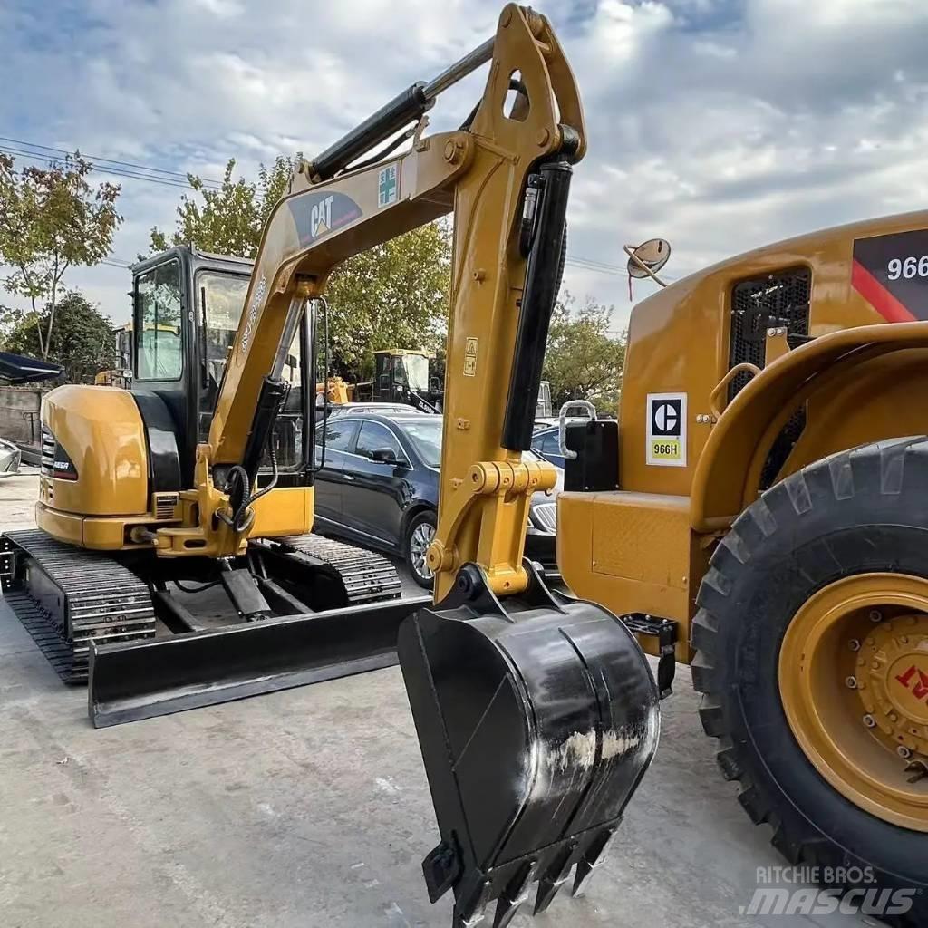 CAT 304 CR Pásové rýpadlá