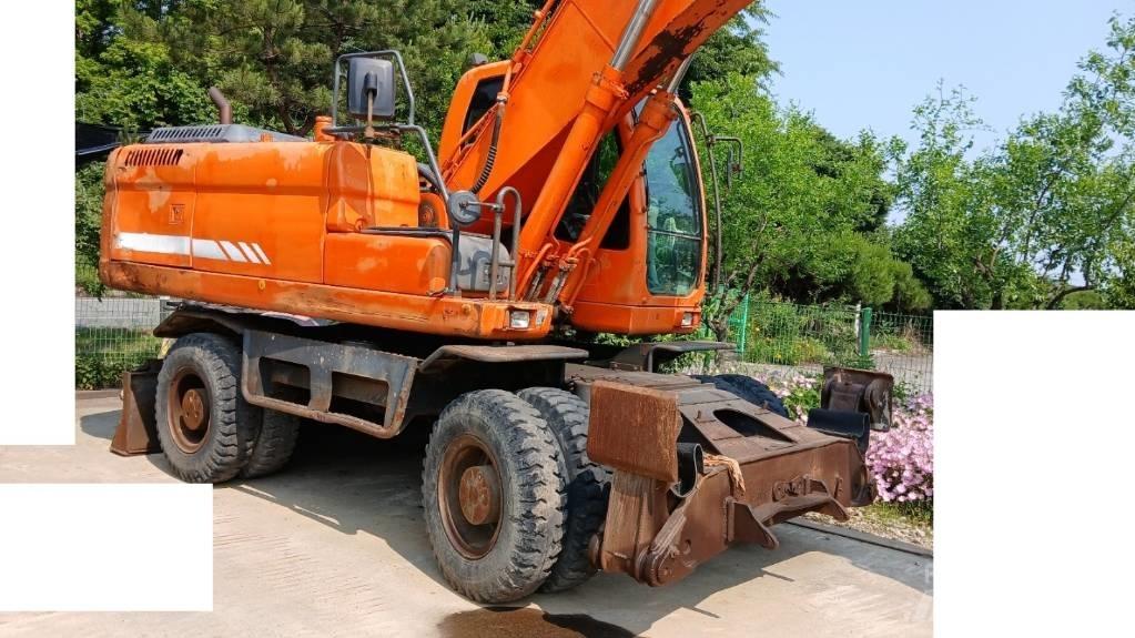 Doosan DX 210 W Kolesové rýpadlá