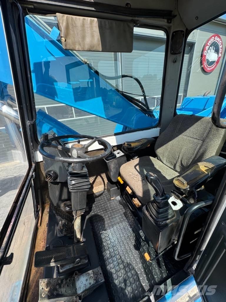 Fuchs MHL 331 Stroje pre manipuláciu s odpadom