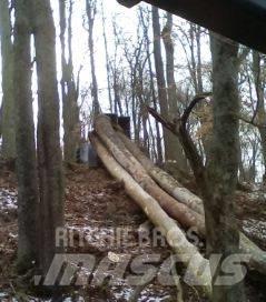 CAT 515 Skidder Šmykom riadené nakladače