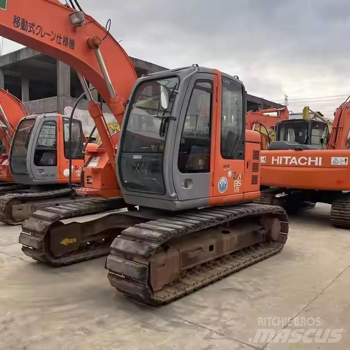 Hitachi ZX135US Pásové rýpadlá