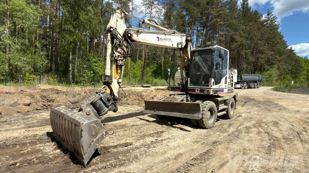 Komatsu PW 148-8 Kolesové rýpadlá