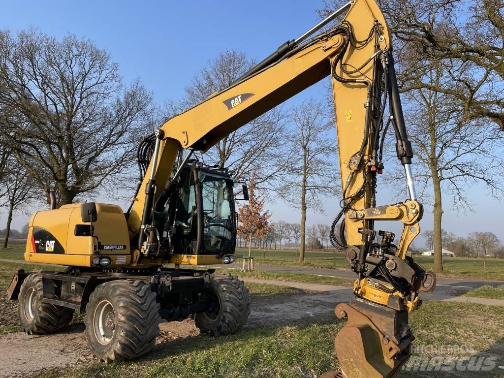 CAT M 313 D Kolesové rýpadlá