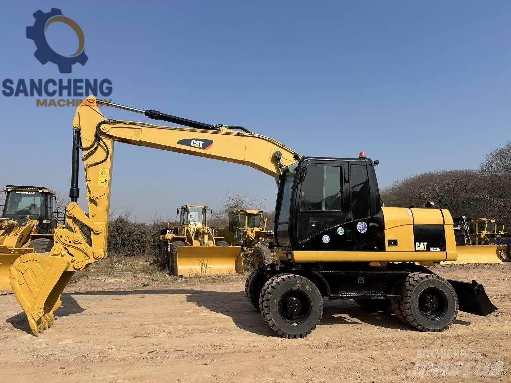 CAT M 320 D2 Kolesové rýpadlá