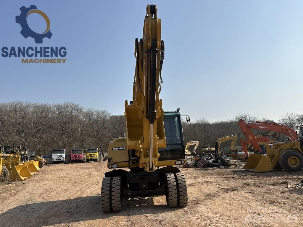 CAT M 320 D2 Kolesové rýpadlá