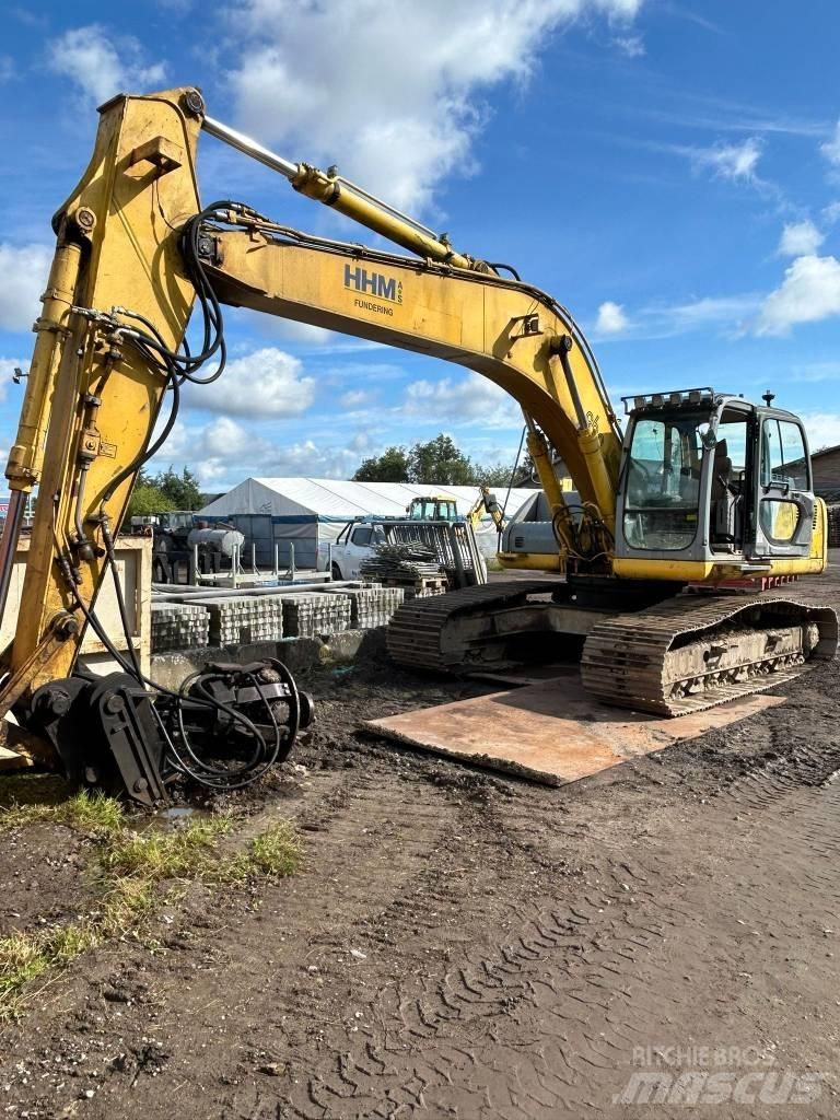 New Holland E 265 Pásové rýpadlá