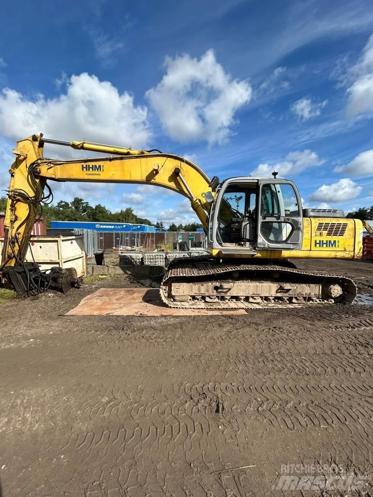 New Holland E 265 Pásové rýpadlá