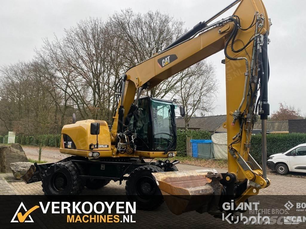 CAT M313D Kolesové rýpadlá