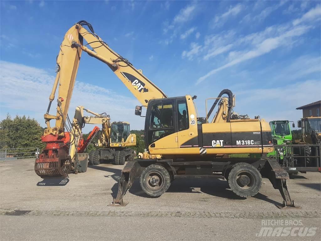 CAT M318C MH Kolesové rýpadlá