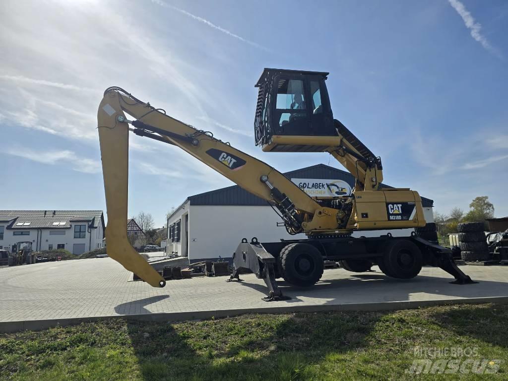 CAT 318D Stroje pre manipuláciu s odpadom