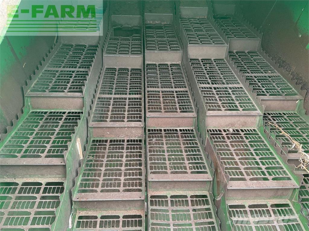 John Deere T560HM Kombinované zberacie stroje