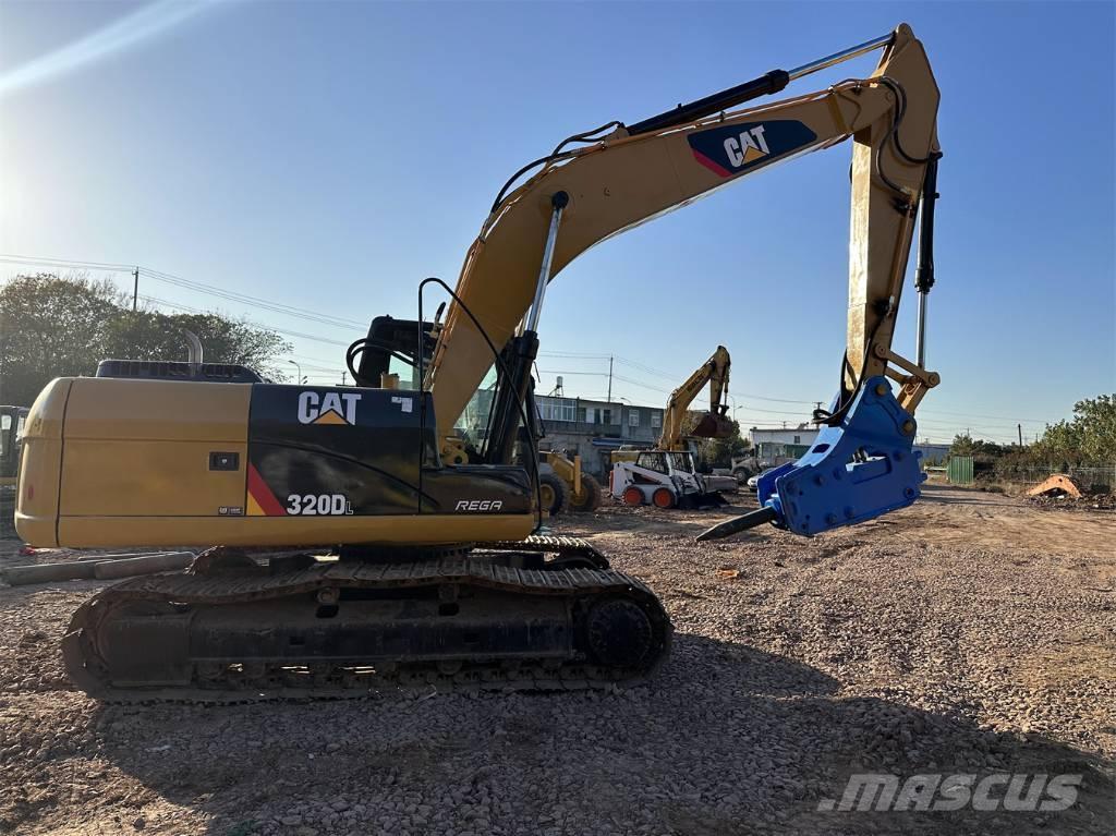 CAT 320DL Pásové rýpadlá