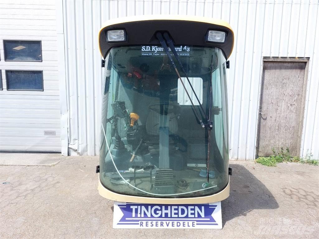 New Holland TX65 Kabíny a interiér