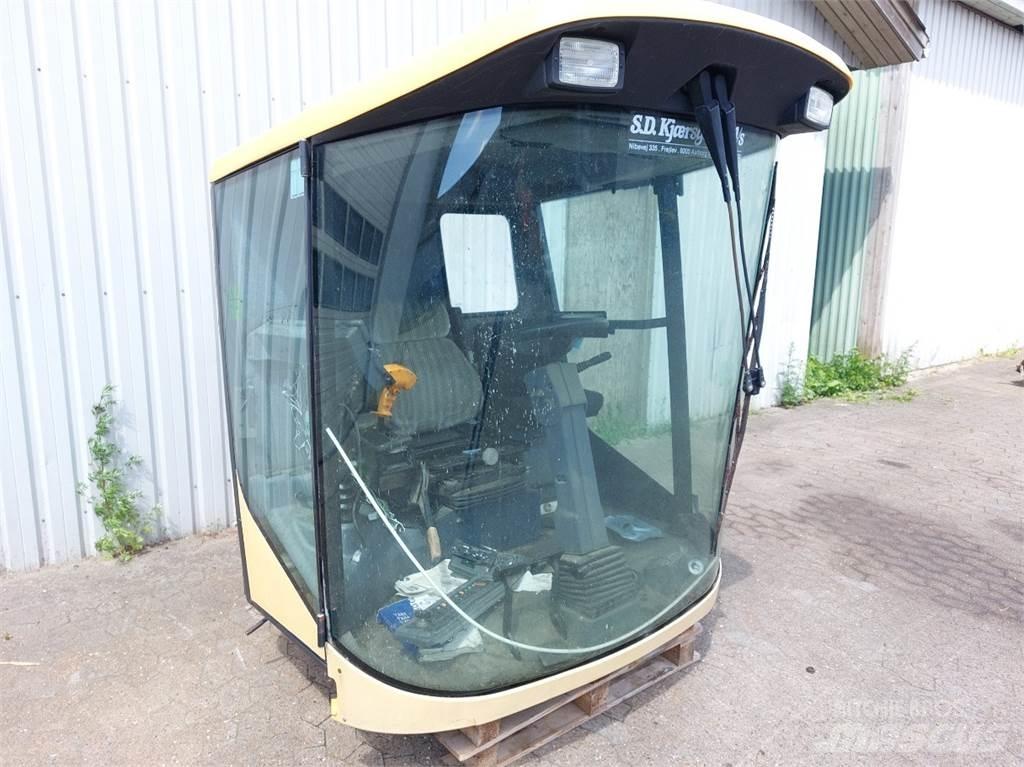New Holland TX65 Kabíny a interiér