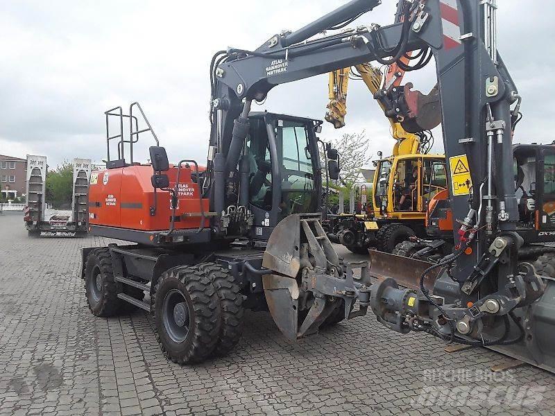 Atlas 140W Kolesové rýpadlá