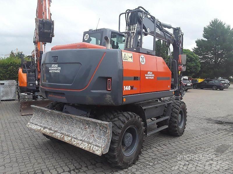 Atlas 140W Kolesové rýpadlá
