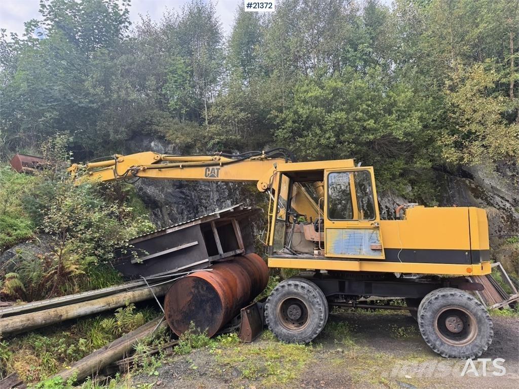 CAT 212B Kolesové rýpadlá