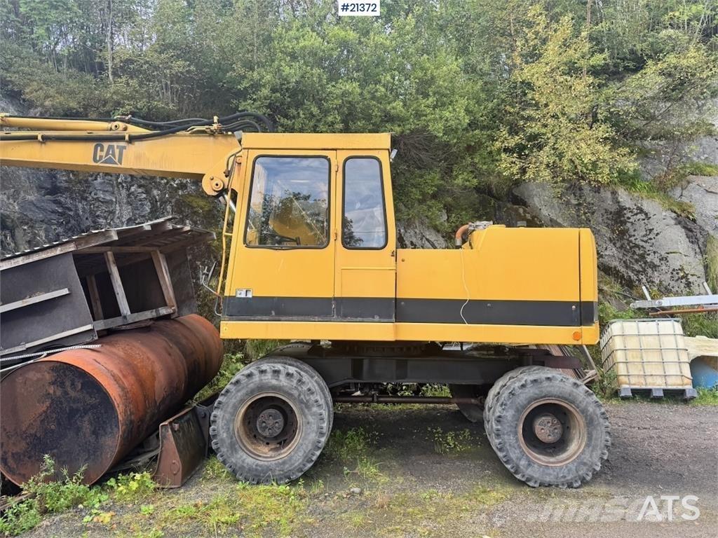 CAT 212B Kolesové rýpadlá