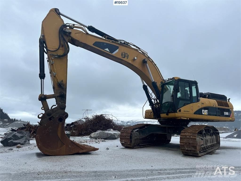 CAT 300D Pásové rýpadlá