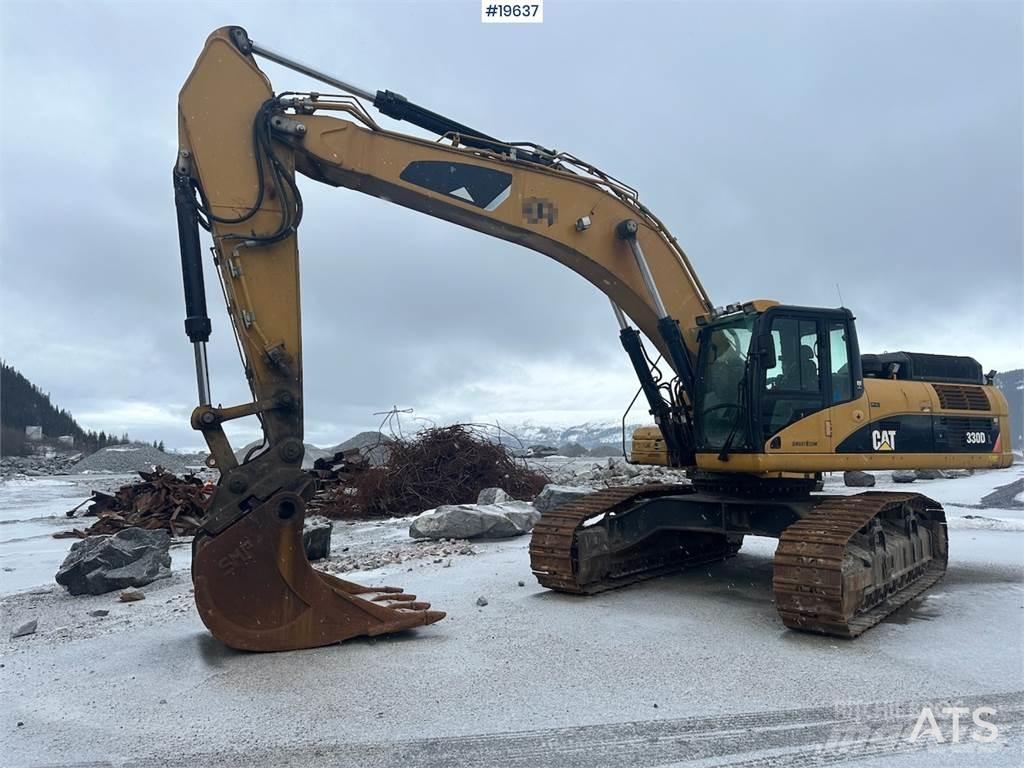 CAT 300D Pásové rýpadlá