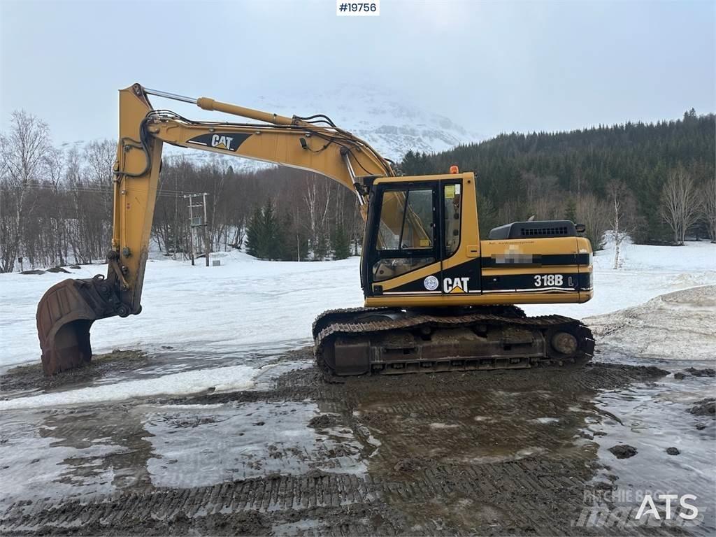 CAT 318BL Pásové rýpadlá