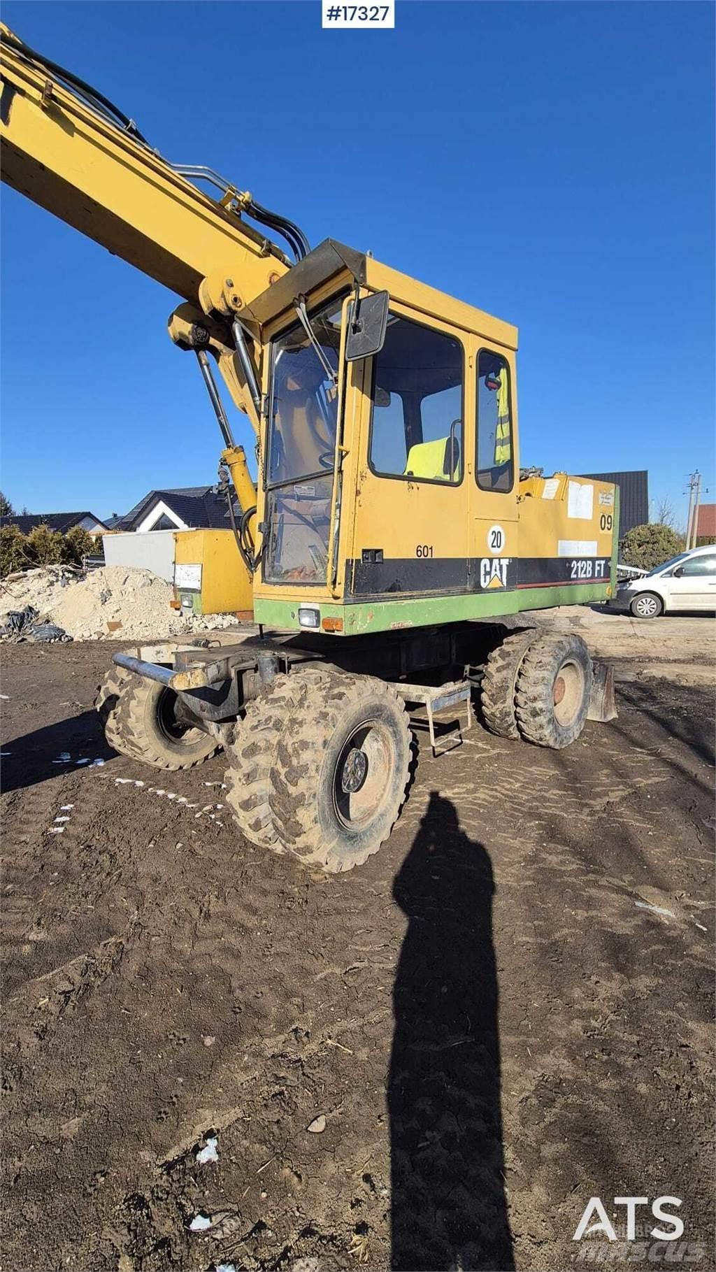 CAT 212BFT Kolesové rýpadlá