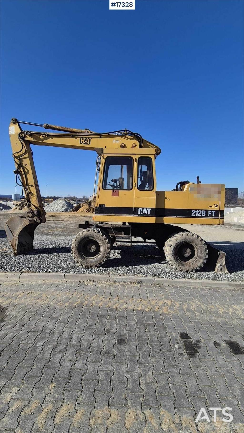 CAT 212BFT Kolesové rýpadlá