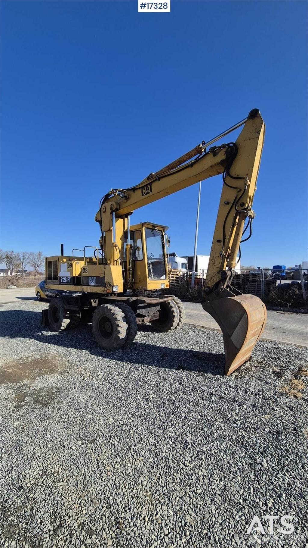 CAT 212BFT Kolesové rýpadlá