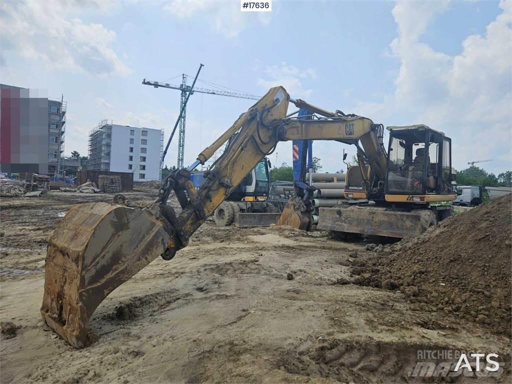 CAT M312 Kolesové rýpadlá