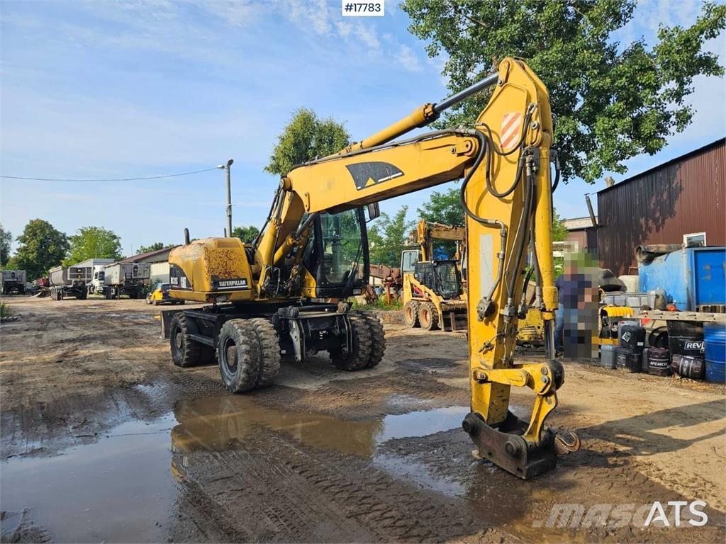 CAT M315C Kolesové rýpadlá