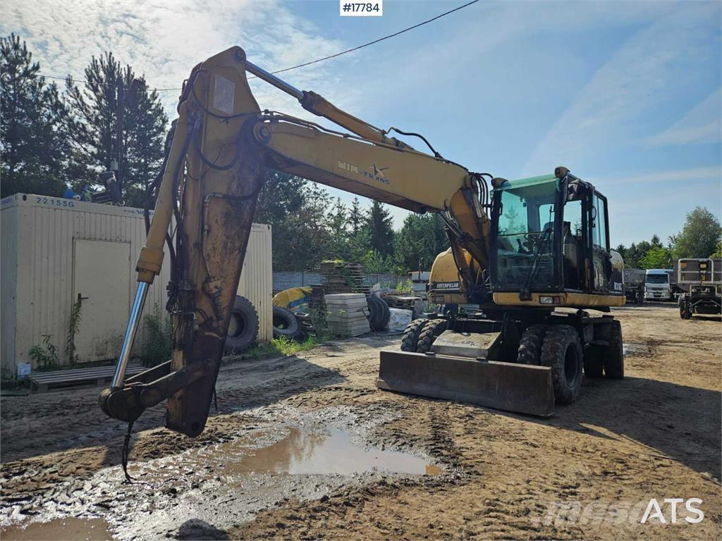 CAT M316C Kolesové rýpadlá