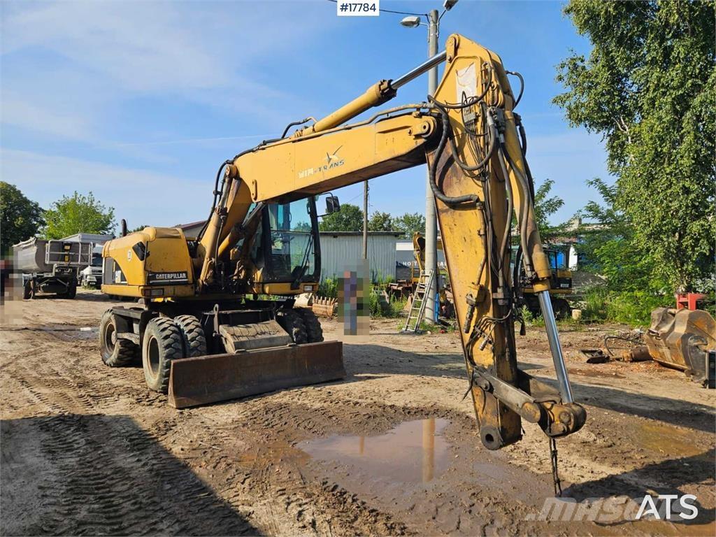CAT M316C Kolesové rýpadlá