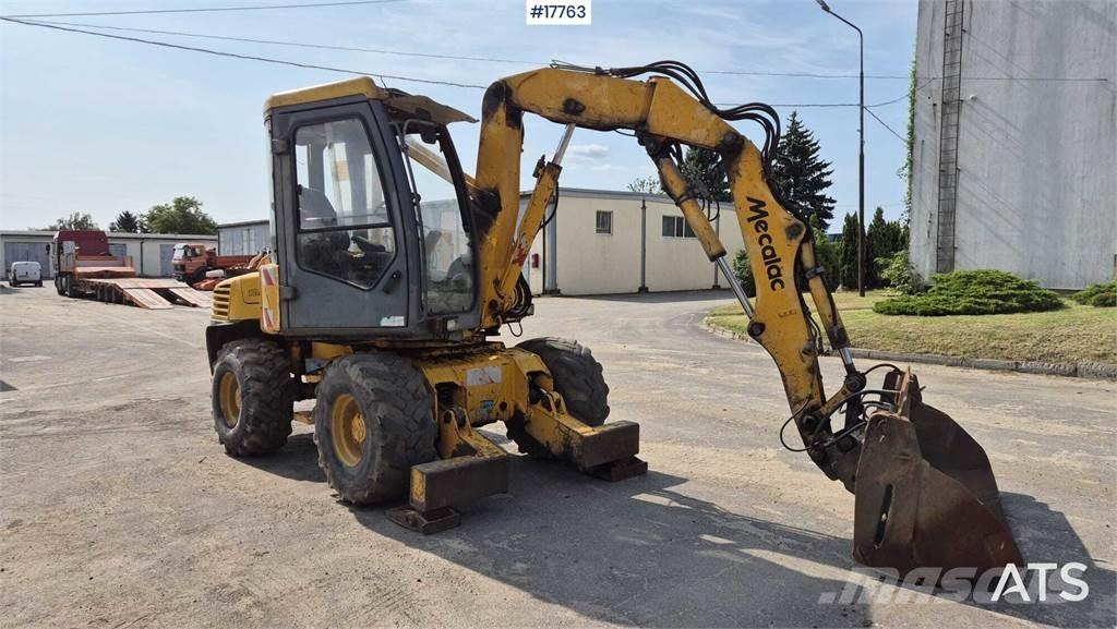 Mecalac 12MX Kolesové rýpadlá