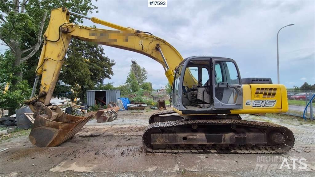 New Holland E215 Pásové rýpadlá