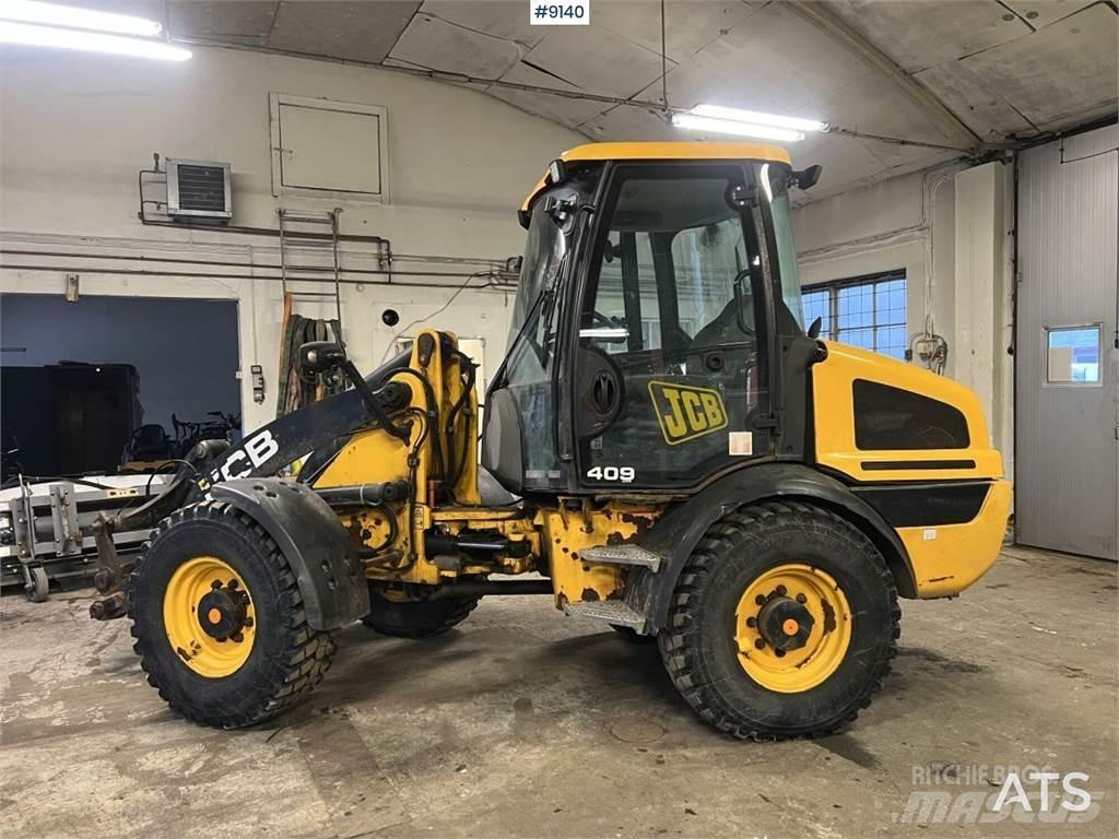 JCB 409 T4 Kolesové dozéry