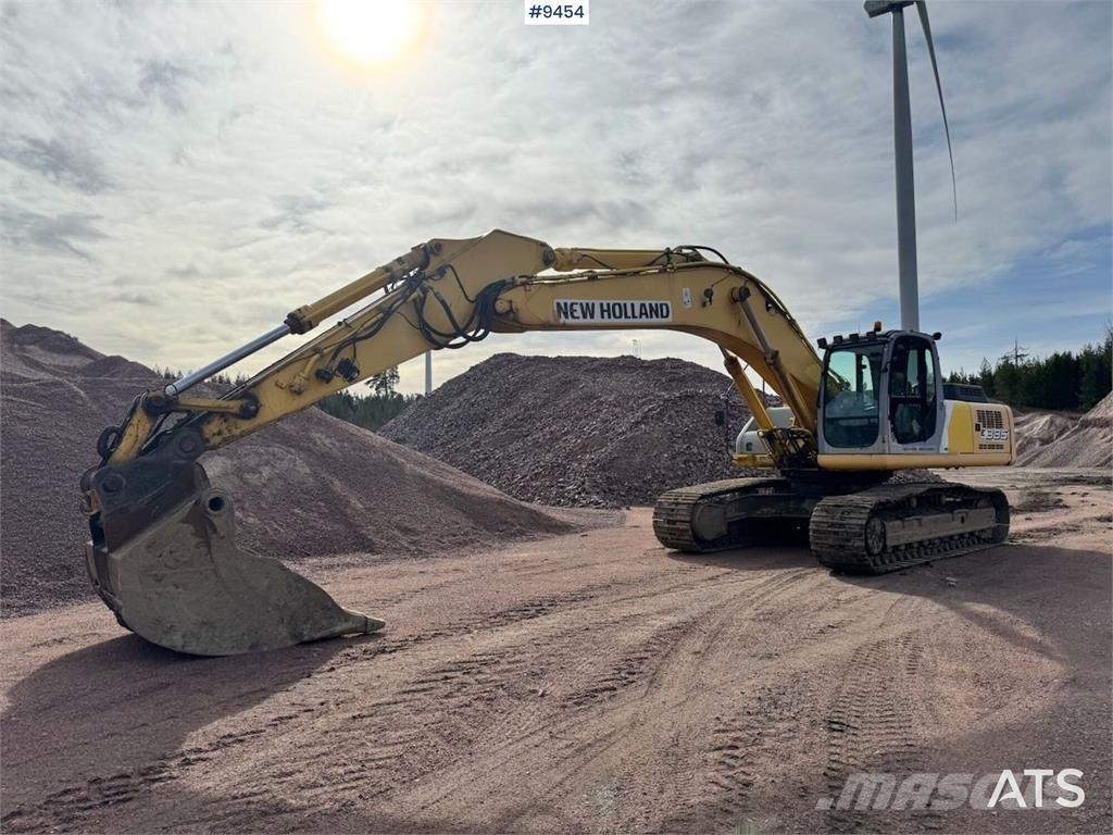 New Holland E385 Pásové rýpadlá