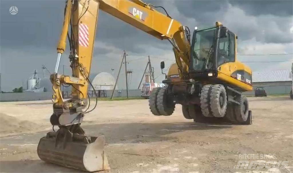 CAT M315C Kolesové rýpadlá
